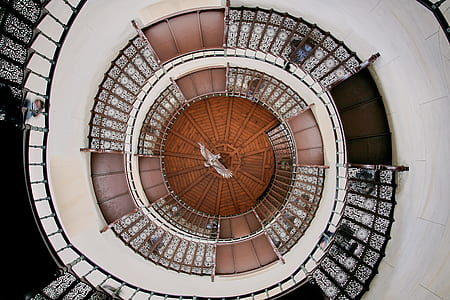 gray, beige, and black spiraling staircase tower thumbnail