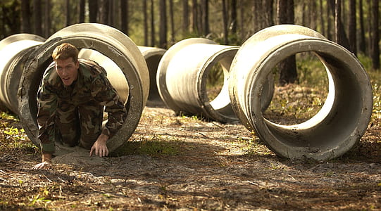 man crawling in tube thumbnail