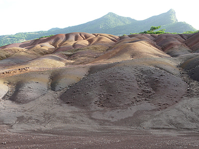 brown land formation at daytime thumbnail