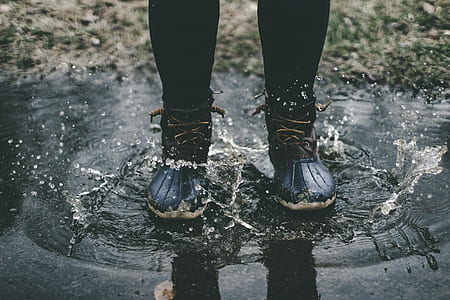 person standing on body of water thumbnail