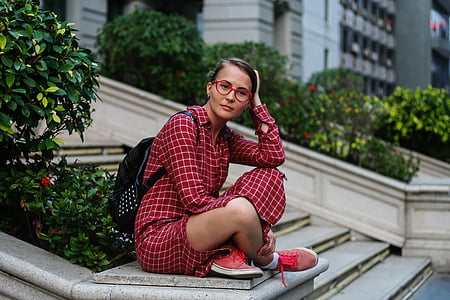 woman in red long-sleeved dress thumbnail