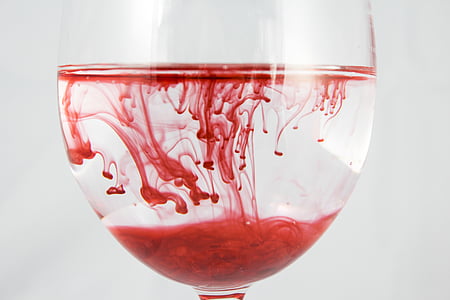 red liquid in clear drinking glass thumbnail