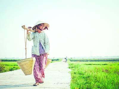 woman carrying basket thumbnail