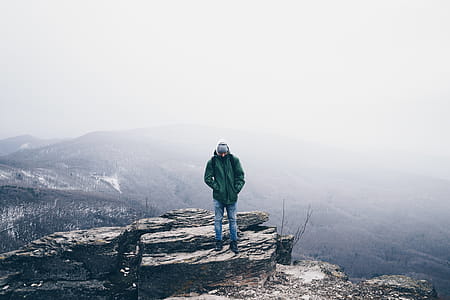 Man Wearing Green Full Zip Snow Jacket thumbnail