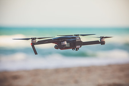 time lapse photography of flying black quadcopter drone thumbnail