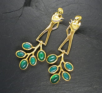 pair of gold-colored and green gemstone accessories thumbnail
