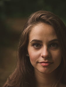 closeup photography of woman face with blonde hair thumbnail
