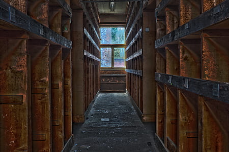 brown wooden cubicles inside room near glass window thumbnail