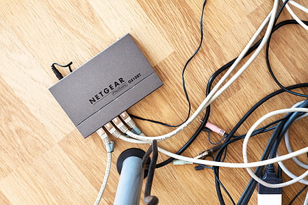 Netgear wireless modem on parquet flooring thumbnail