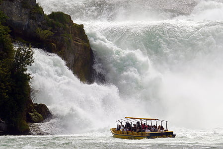 group of people inside boat on body of water thumbnail
