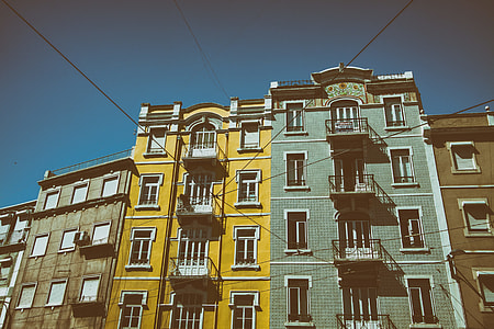 Wide angle shot of colourful buildings on the streets of Lisbon in Portugal. Image captured with a Canon DSLR thumbnail