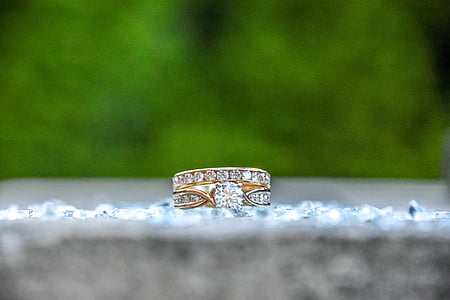 gold-colored ring with clear gemstone thumbnail
