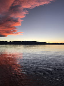 body of water near mountain thumbnail