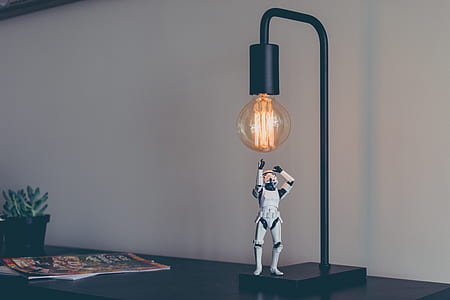 stormtrooper figure under of table lamp thumbnail