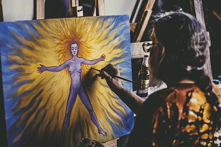 man painting woman on canvas thumbnail