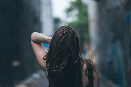 woman wearing black top during daytime thumbnail