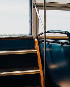 brown wooden stair near blue chair thumbnail