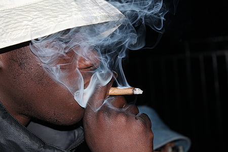 man smoking cigar thumbnail