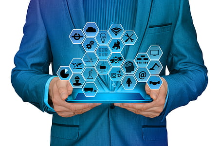 person holding blue tablet with hologram applications thumbnail