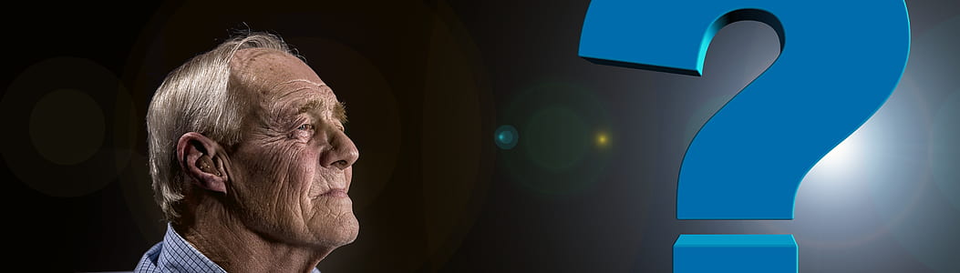 man wearing sport shirt in front of question mark thumbnail