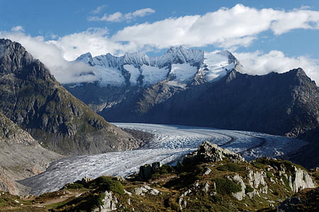 aerial photography of river near mountain thumbnail