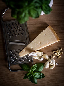 stainless steel cheese shredder on table thumbnail