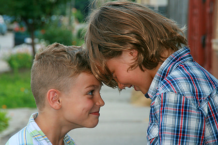 boy and girl headbutting thumbnail