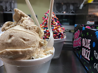 white disposable cup filled with ice cream thumbnail