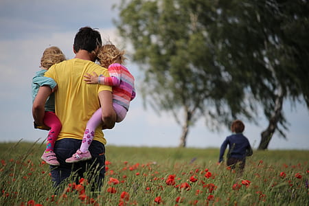 man holding two girls thumbnail