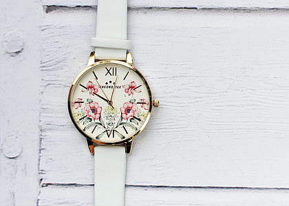 round white floral analog watch with white leather strap thumbnail
