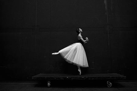 dancing ballerina on black rolling platform thumbnail