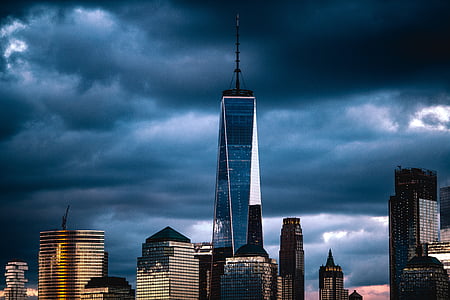nimbus clouds over city buildings thumbnail