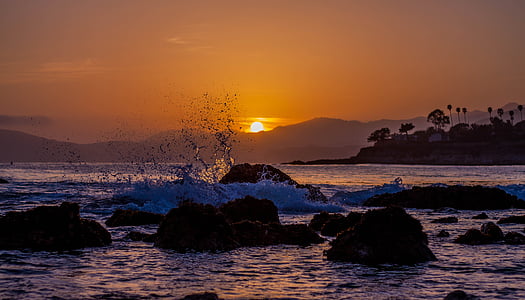 seawaves in rocks during golden hour thumbnail