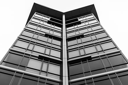 low-angle photography of grey and black building thumbnail