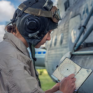 person holding compass thumbnail