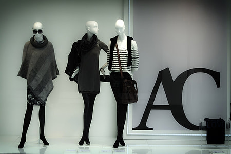 three black shirts on mannequins thumbnail