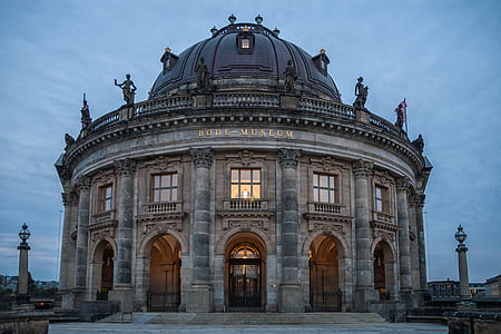 gray and beige dome-top concrete building during daytime thumbnail