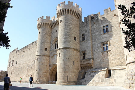 brick castle under blue sky during daytime thumbnail