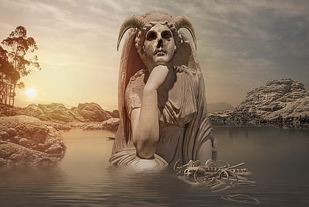 statue in the middle of pond thumbnail