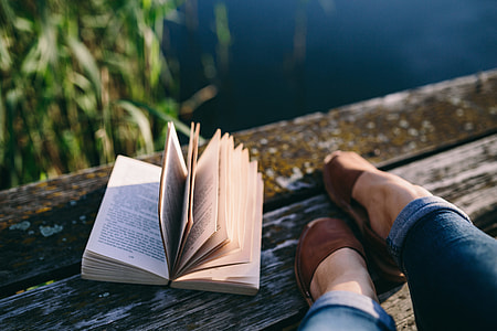 Reading book at lake thumbnail