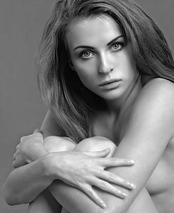 grayscale photo of sitting topless woman thumbnail
