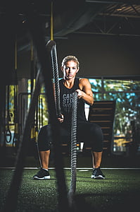 woman holding rope on gym thumbnail