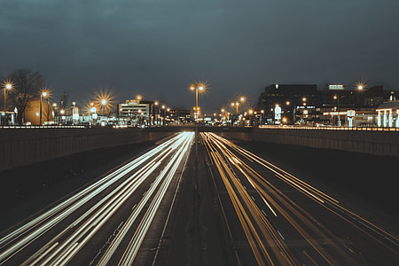 light streaks on on road in the city thumbnail