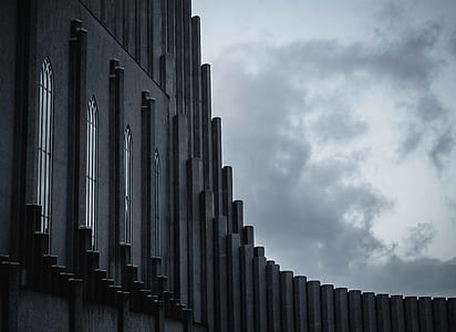 building under clouds thumbnail