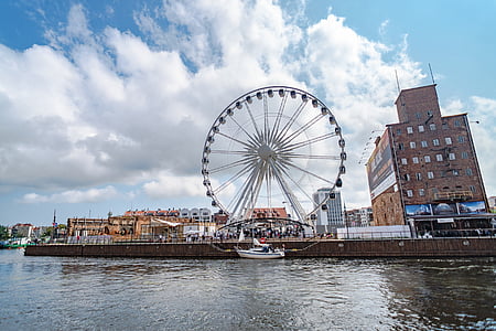 Ferris Wheel beside boat thumbnail