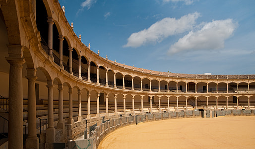 beige concrete arena during day time thumbnail