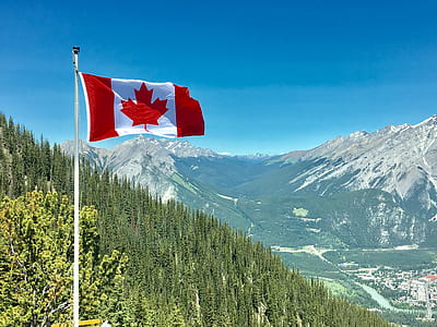 Canada Flag With Mountain Range View thumbnail