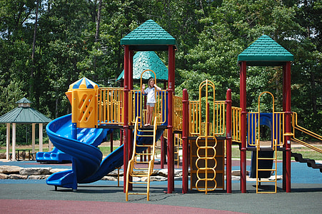 woman on top of house playground thumbnail