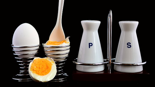 white egg on gray steel egg rack thumbnail