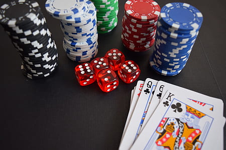 close-up photography of poker game set on black surface thumbnail